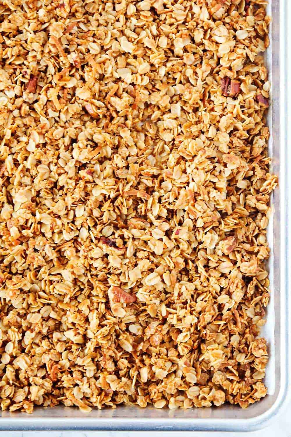 homemade granola on baking sheet