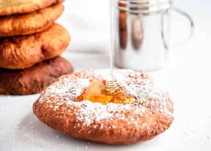 fry bread with powdered sugar and honey on top