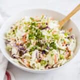 coleslaw in a white bowl