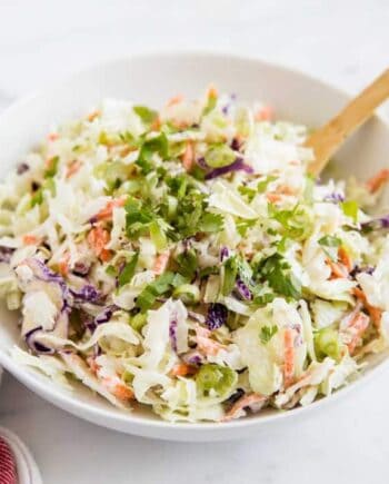 coleslaw in a white bowl