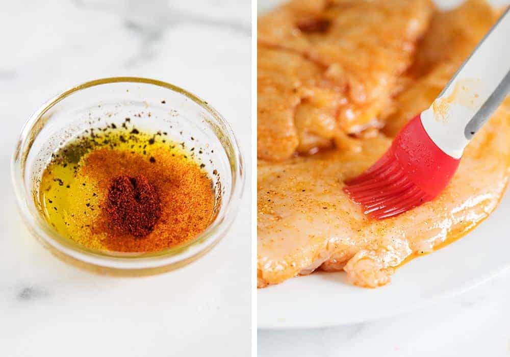 Brushing marinade on raw chicken breast.