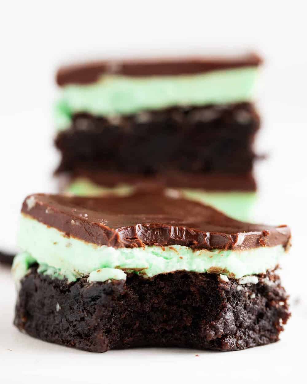 Mint brownies with a bite taken.