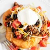 navajo taco with hamburger and sour cream