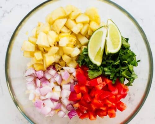 pineapple salsa ingredients in a bowl