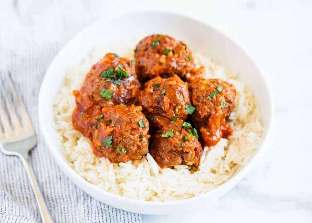 porcupine meatballs with rice in white bowl