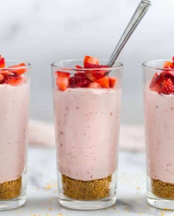 strawberry mousse in glass cup with spoon