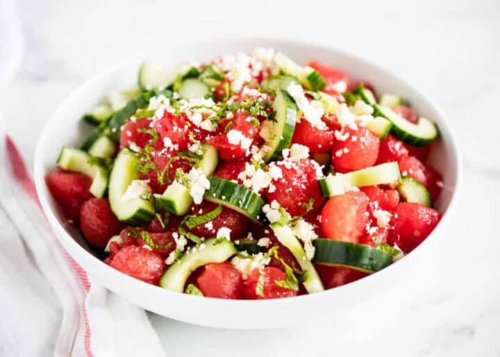watermelon feta mint salad in a white bowl