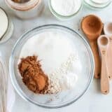 dry ingredients for chocolate cake in a glass bowl