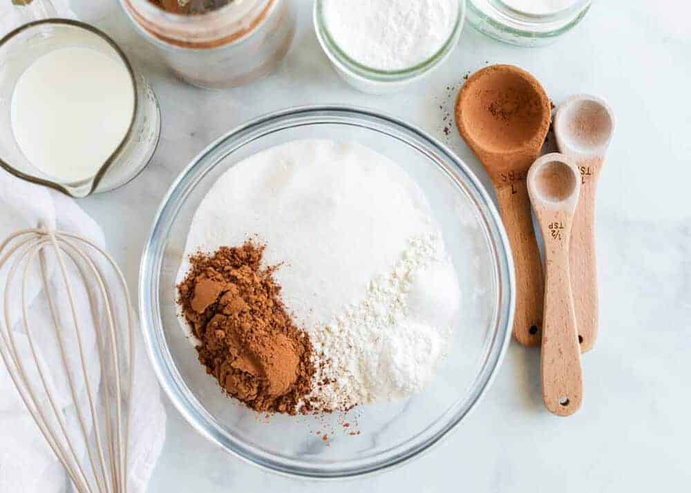 Baking ingredients and tools on counter.