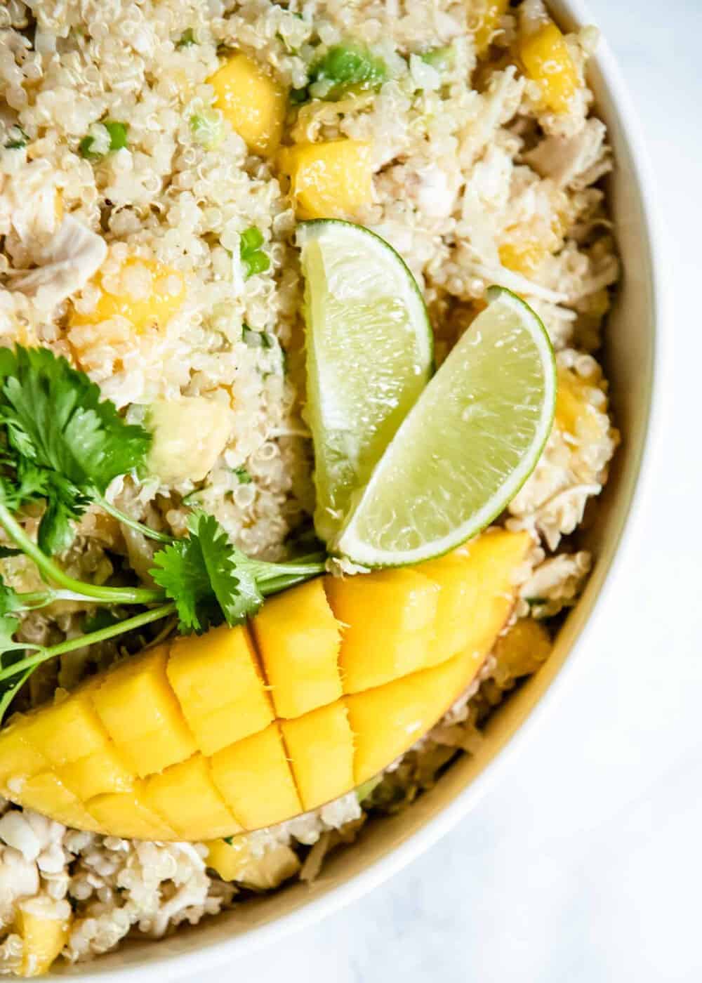 mango quinoa salad with lime in bowl