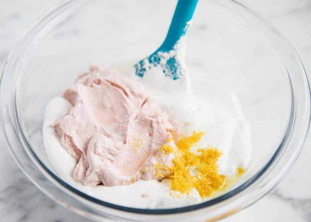 Strawberry fruit dip ingredients in a glass bowl.