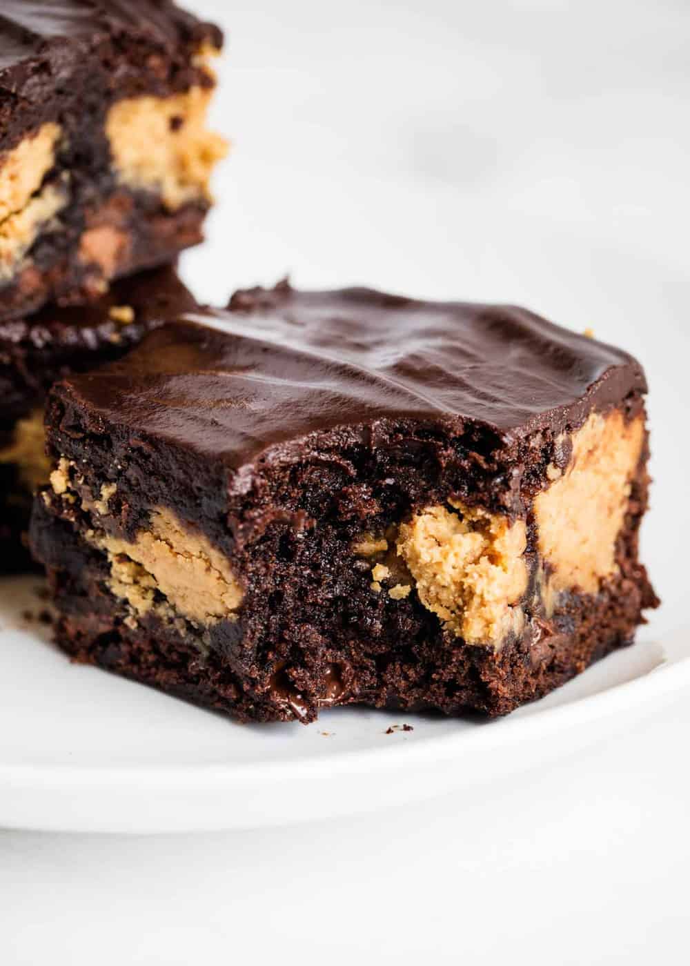 peanut butter brownies with a bite taken out 