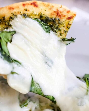 pesto pizza with melted cheese