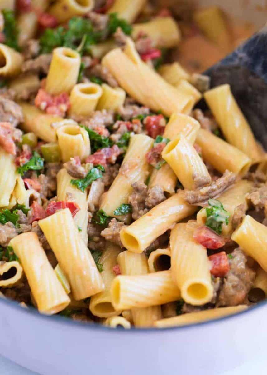 rigatoni noodles with bolognese sauce in pan