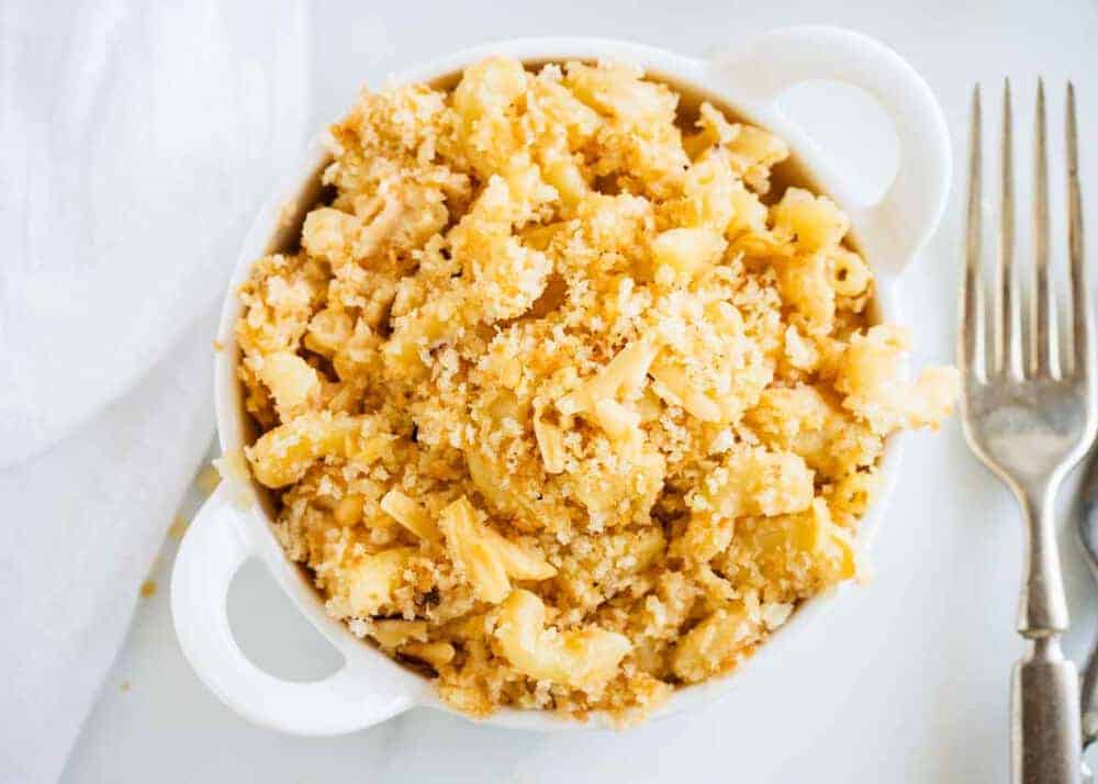 gouda mac and cheese in a white bowl with handles