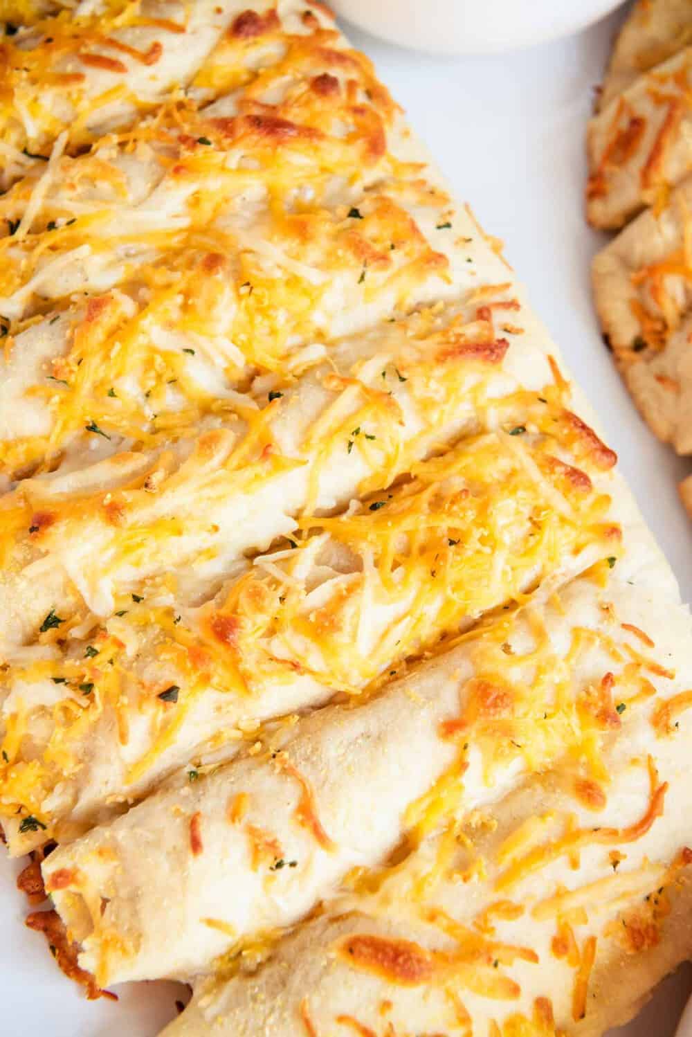 Cheesy garlic bread slices.