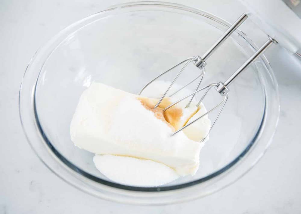 Beating together ingredients for crepe cream filling.