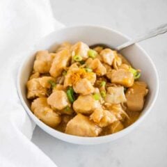 orange chicken in white bowl