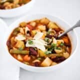 minestrone soup in a white bowl