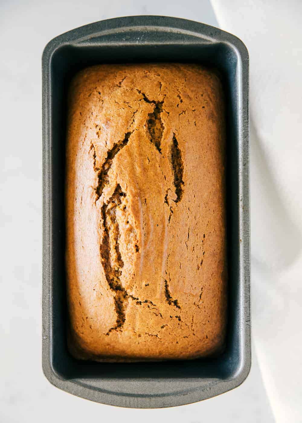 Pumpkin bread loaf in pan.