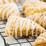 glazed pumpkin scones on a cooling rack