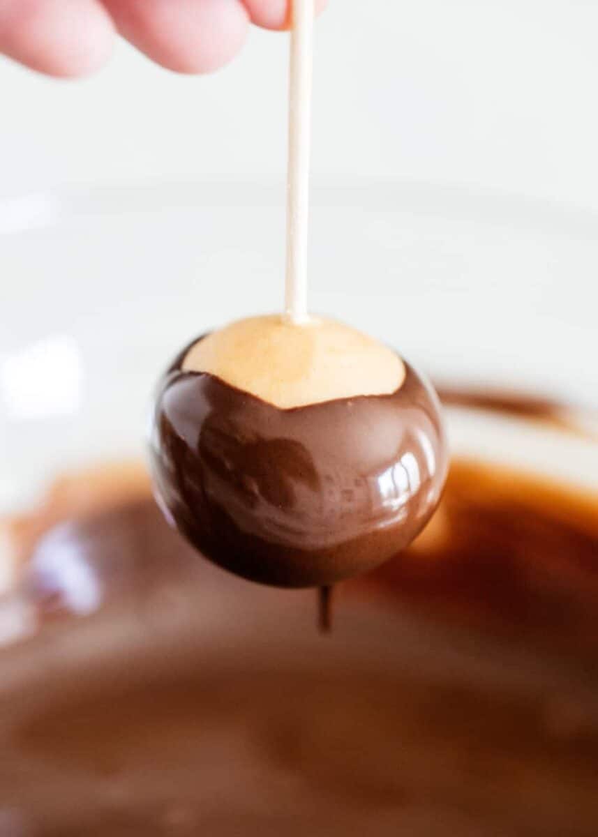 peanut butter buckeye ball dipped in chocolate