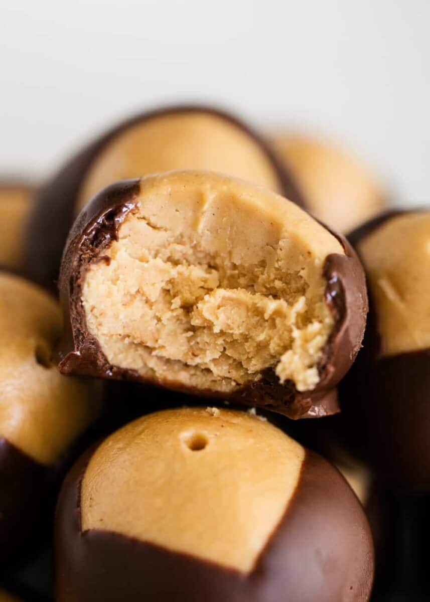 chocolate peanut butter buckeye with a bite taken out 