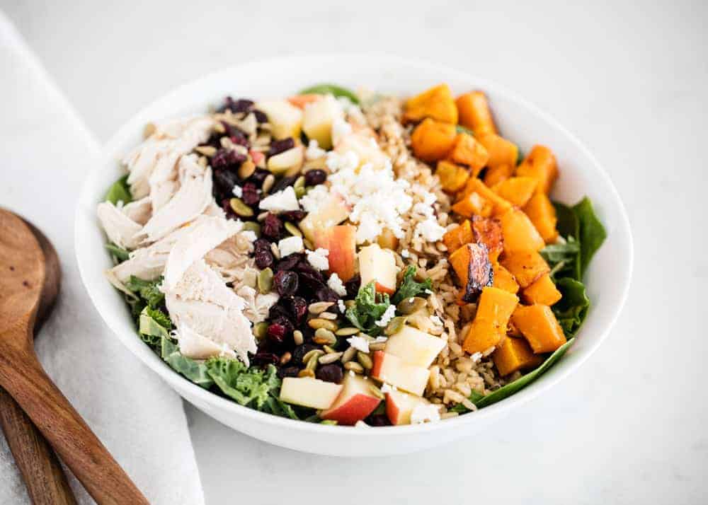 Fall harvest salad in a white bowl.