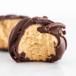 chocolate peanut butter ball with a bite taken