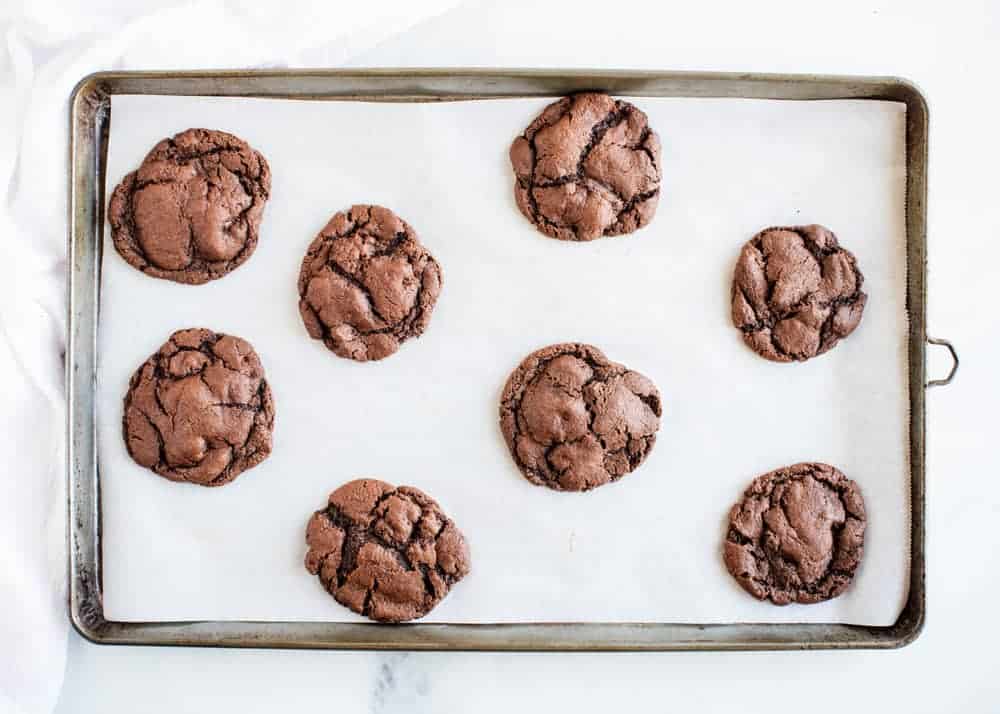 Chocolate cookies on a baking sheet. 