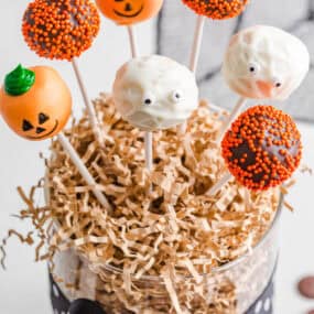 Halloween cake pops served as an easy Halloween dessert in upright tin.