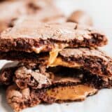 chocolate rolo cookies with caramel oozing out
