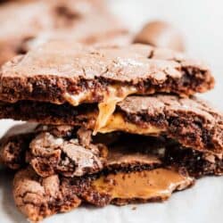 chocolate rolo cookies with caramel oozing out