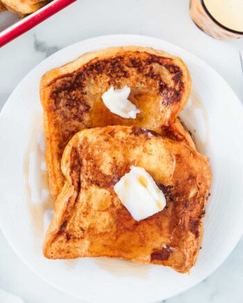 eggnog french toast on a white plate