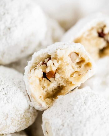 mexican wedding cookie with a bite taken