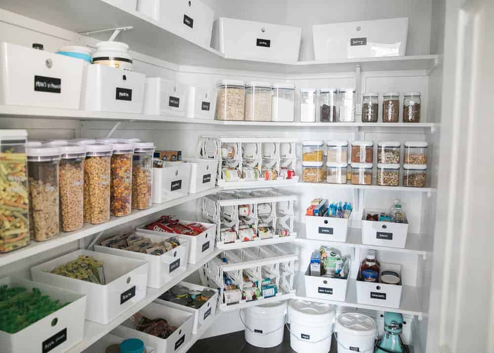 Pantry shelves with bins.