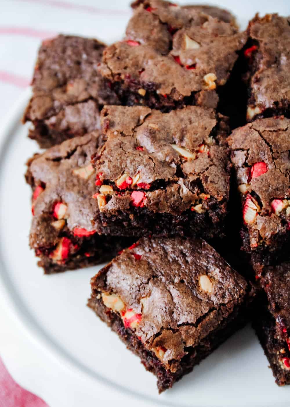 Peppermint brownies on a white plate.