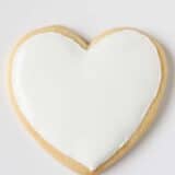 heart sugar cookie with white icing on top