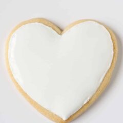 heart sugar cookie with white icing on top