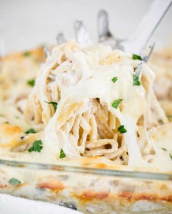 turkey tetrazzini being scooped out of dish