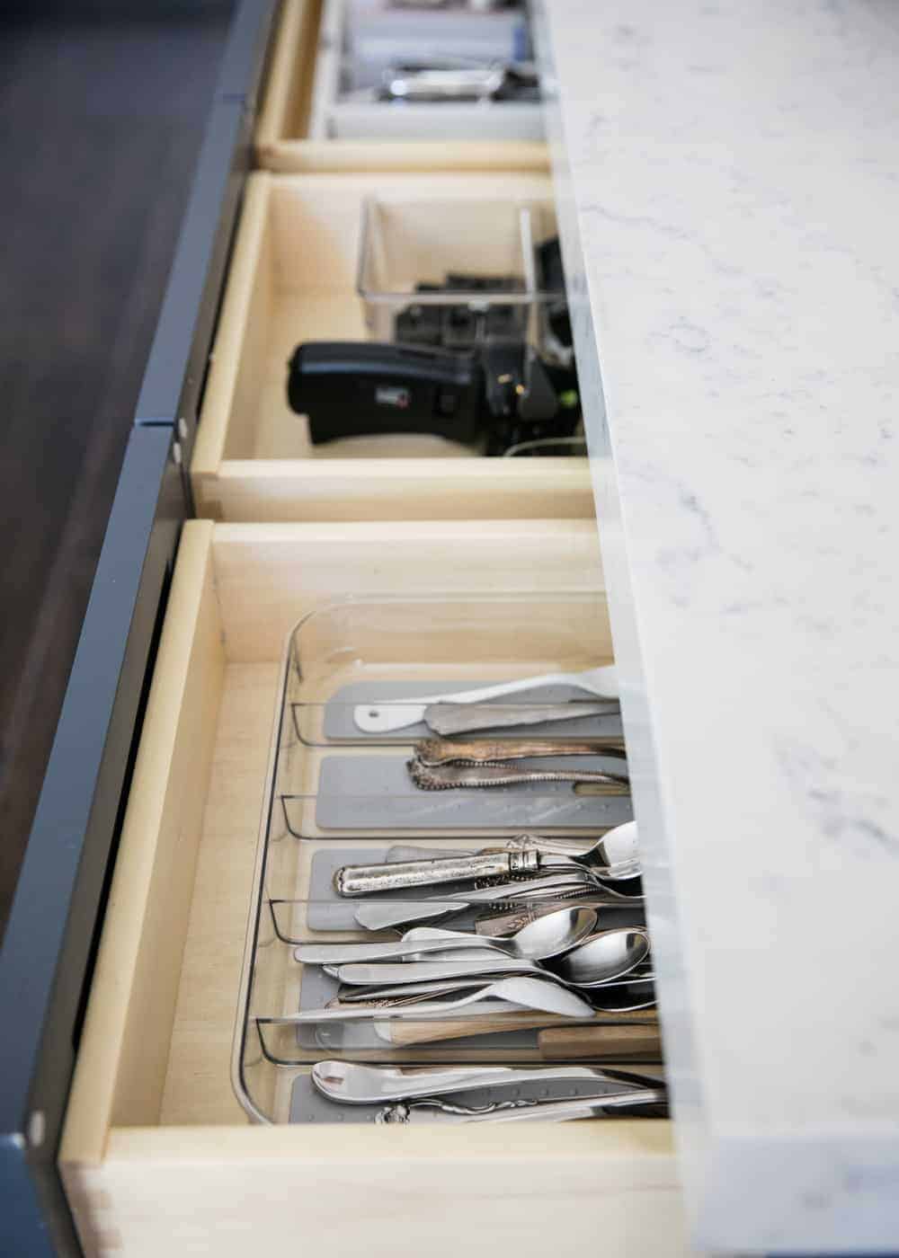 silverware organized in a drawer 