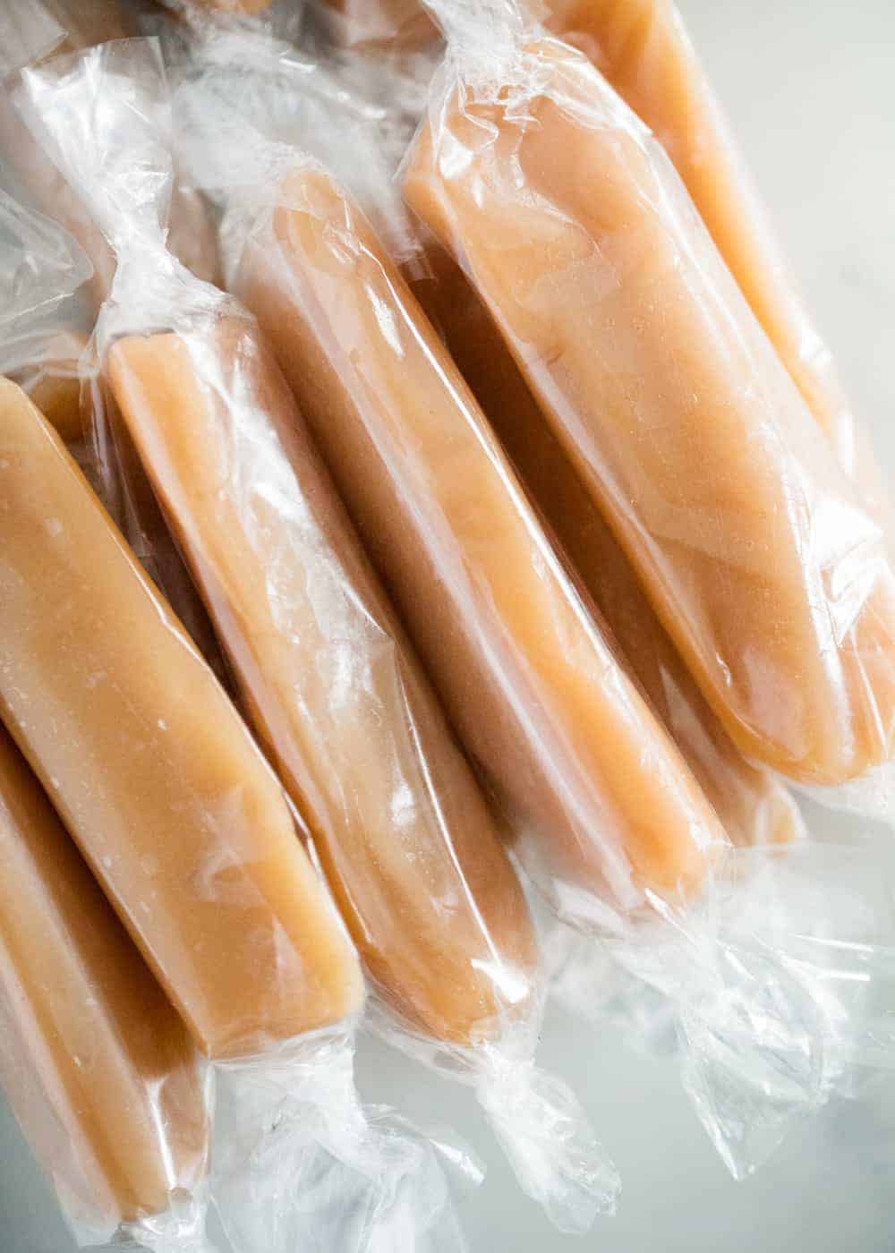 Caramel candies wrapped in cellophane.