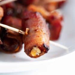 bacon wrapped dates on plate