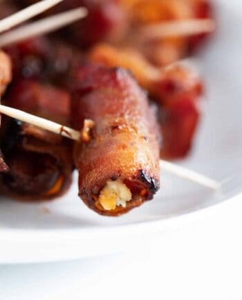 bacon wrapped dates on plate