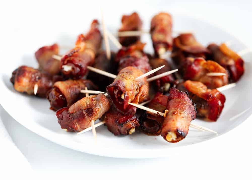 Bacon-wrapped dates with a toothpick.