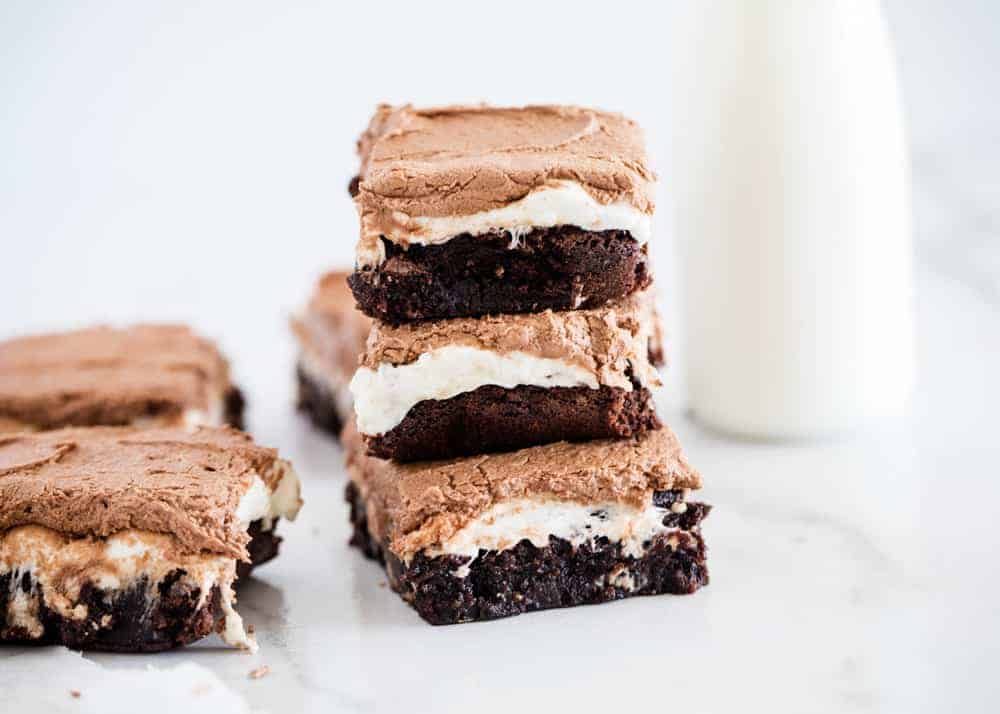 Stacked marshmallow brownies with milk.