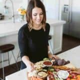 Jamielyn Nye making a charcuterie board