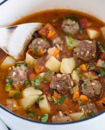 mexican meatball soup in white pot