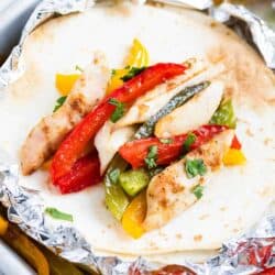 chicken fajitas on a flour tortilla