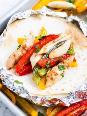 chicken fajitas on a flour tortilla